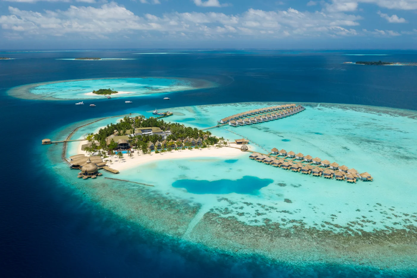 outrigger-maldives-maafushivaru-resort-aerial1_retouched.webp